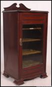 A Victorian mahogany pedestal music cabi