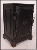 An industrial vintage cast metal oven ha