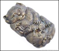 A vintage style brass cat and rat match