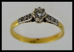 An 18ct gold single stone diamond ring.