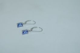 A pair of 925 silver earrings with amethyst gem stone drops and lever backs. Weight 1.5g.
