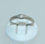 A 925 silver ring set with clear round cut stone marked 925 with leaping deer. Size I. Weight 1.