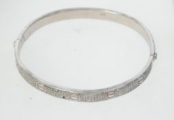 A 925 silver Art Deco style bracelet bangle with pave set CZ and invisible clip clasp. Weight 20g.