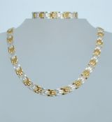 Vintage 925 silver necklace and bracelet set with planished silver and gilt chain links. Weight 49g.
