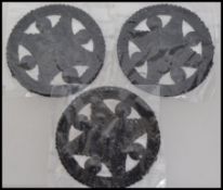 Three large early 20th century hand sewn funeral Jet beadwork motifs. Measures 9cms.