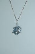 A 925 silver pendant necklace strung with a Venetian mask pendant on a fine Figaro silver chain.