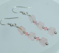 A pair of 925 silver earrings with rose quartz and glass drops with hook backs. Weight 4.