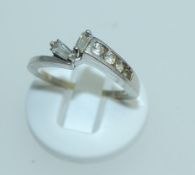 A 925 silver ring set with clear baguette and round cut stones. Size N.5.