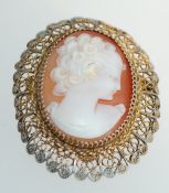 A vintage 800 silver shell cameo brooch with good carved cameo of a maiden in a filigree frame with