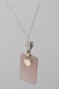 A 925 silver rococo style pendant necklace set with a faceted rose quartz pendant on a belcher link