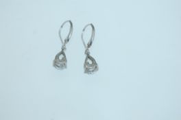 A pair of 925 silver earrings teardrop CZ gem stone drops and lever backs. Weight 2.5g.