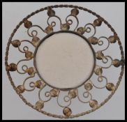 An early 20th century white metal large paste and Jet set motif with filigree and rope twist ground