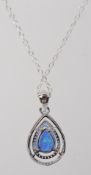 A 925 silver necklace with an opalite and CZ set pendant in a tear drop shape. Measures 18inches.