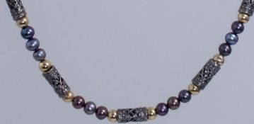 A 1950s Venetian silver and pearl bead necklace with graduated round pearl beads interspaced with