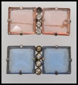 Two 1930s Czech white metal cloak cape clip clasps one set with two large hand faceted blue glass