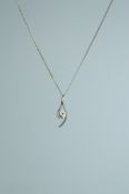 A 925 silver pendant necklace strung with an CZ set stylized wishbone pendant on a fine italian
