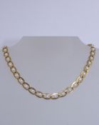 A vintage Napier choker necklace circ 1970s having gold tone oval links inset with simulated pearl