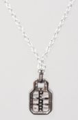 A 925 silver Art Deco style pendant necklace set with round and baguette cut CZ on a belcher link