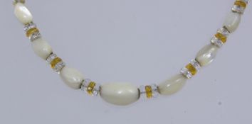 A 1950s Art Deco Czech mother of pearl and glass bead necklace with oval mother of pearl and
