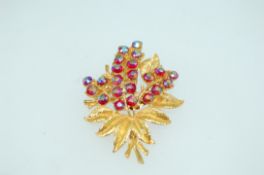 A good quality vintage yellow metal brooch spray brooch with pink Aurora Borealis rhinestones,