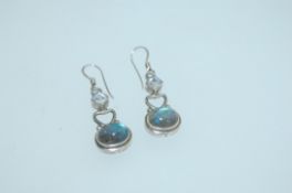 A pair of 925 silver earrings with peacock agate and clear stone drops and fishhook backs. Weight 6.