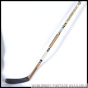 A signed Ice Hockey Stick by Sher-Wood Feather Glas being signed ( unknowned ) to the stem.