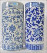 A large Chinese blue and white floor vase / umbrella stand together with another similar ( see