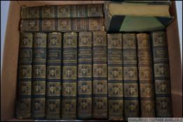 A set of 14x vintage leather bound Charles Dickens volumes.