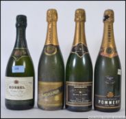 4 bottles of champagne to include Korbel, Pommery,