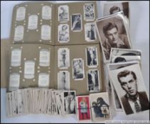 A collection of cigarette cards to include Carreras film stars and others loose in tin etc