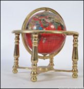 A contemporary 20th century brass mounted gemstone globe,