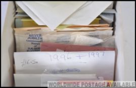 A collection of unused / unfranked stamps dating from the 1970's to include books of 1st class