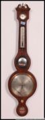 A 19th century mahogany mercury banjo wall barometer with silvered dial and thermometer with