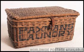 A good original vintage Paxman's Laundry wicker laundry advertising basket,