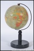 An English 6 inch terrestrial table globe on wooden stand, Philips, London, 1930`s,