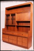 A retro 1970's large Parker Knoll Danish influence teak sideboard / dresser cabinet.