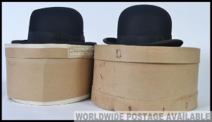6 7/8 Gents bowler hat , plus one other of similar size marked Henry Heath by Royal Warrant.