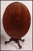 A mahogany breakfast table,