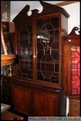 A 19th century Gerorgian library bookcase cabinet / cupboard.