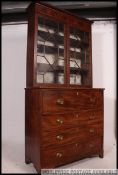 A 19th century Georgian mahogany secretaire / bureau bookcase cabinet.