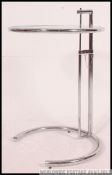 After Eileen Grey, a E1027 chrome and glass side table, originally designed 1927,