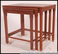 A 1970's retro teak wood nest of tables,