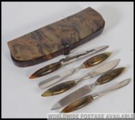 A tortoiseshell cased manicure set to include a complete manicure set W10cm
