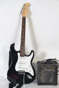 An electric six string guitar by Burswood complete with carry case along with amp and leads