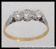 An 18ct gold and platinum vintage ladies diamond ring.
