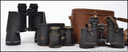 A collection of early to mid 20th century binoculars to include Theatre,
