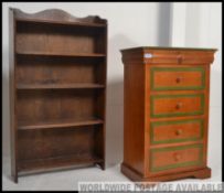 A vintage small oak open faced bookcase cabinet together with a five drawer painted pine chest of