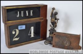 A collection of vintage date cards from a wooden desk clock together with a vintage 19th century