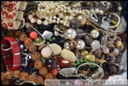 A collection of unsorted costume jewellery to include bracelets, bangles,