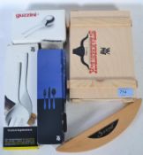 A collection of flatware to include a cased WMF fork and steak knife set, a waiters friend,